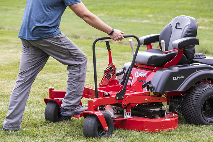 Country Clipper Boulevard residential grade zero-turn mower with joystick steering and front step hand rail.